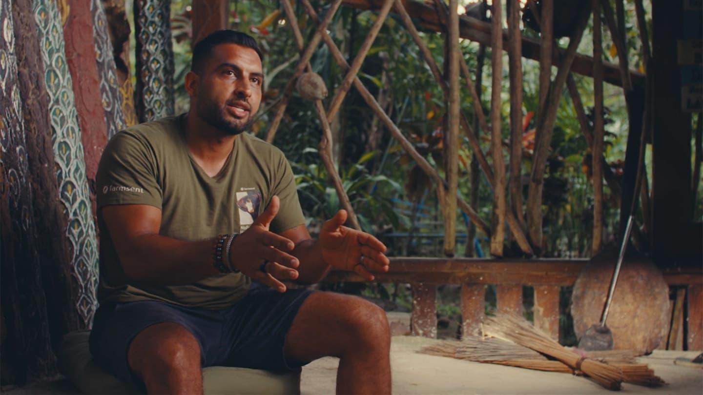 Farmsent team member speaking in an interview on a farm veranda in Indonesia