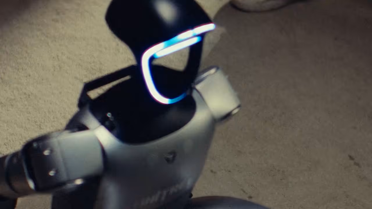 Close-up of a humanoid robot's head with a glowing visor